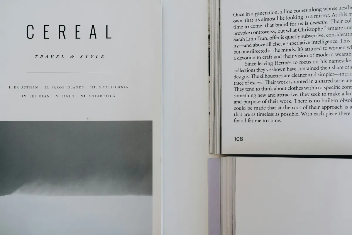 An open editorial magazine showcasing typography-led layout design — the visual register Neural Tech Daily aims for